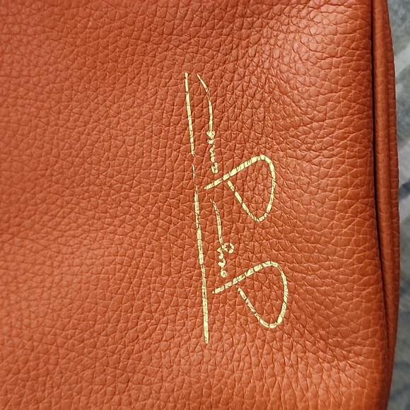Luxe Orange Leather Convertible Backpack